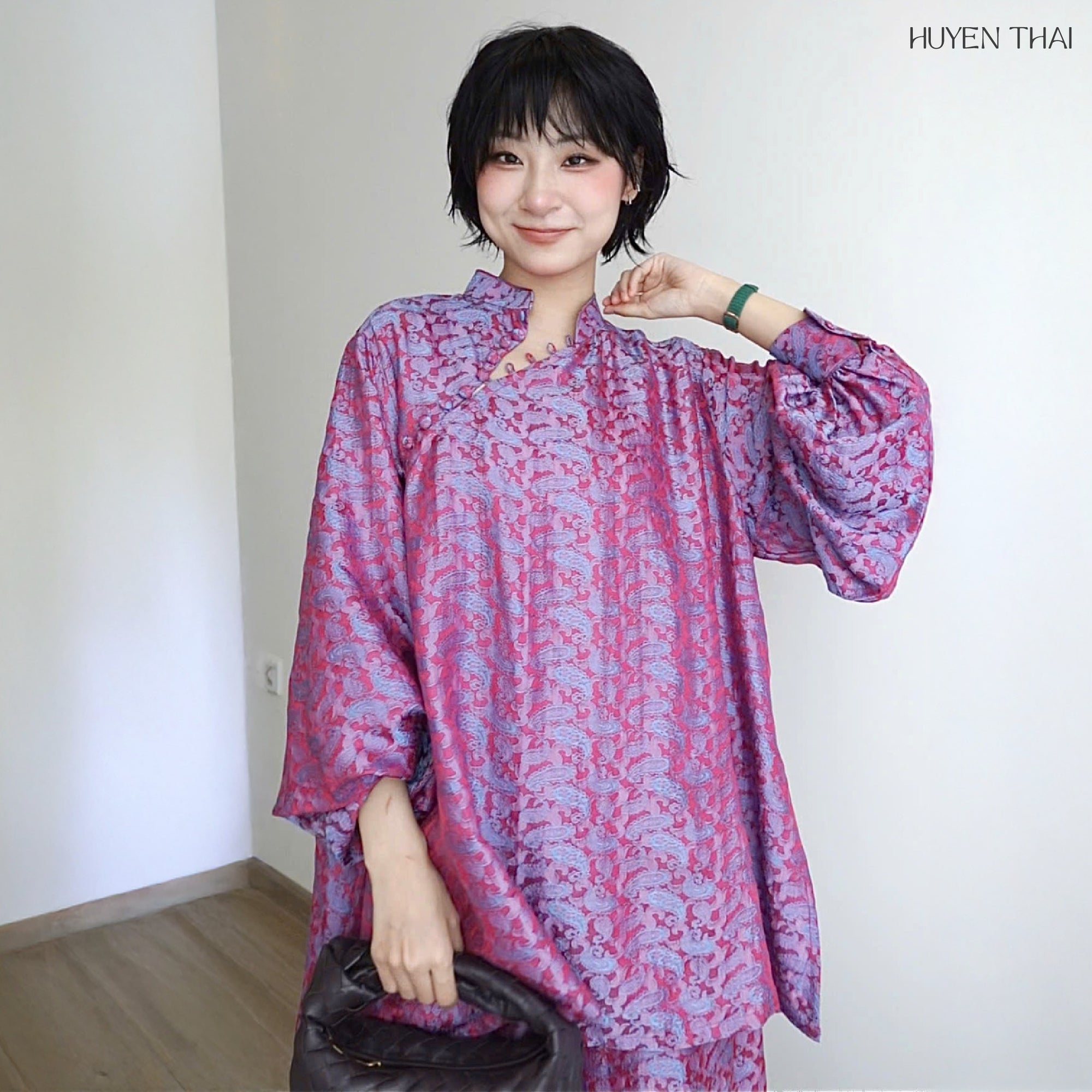 "KY Ao-Ngan pink silk Ao dai by Huyen Thai, modern Vietnamese design, artisan jacquard pattern"