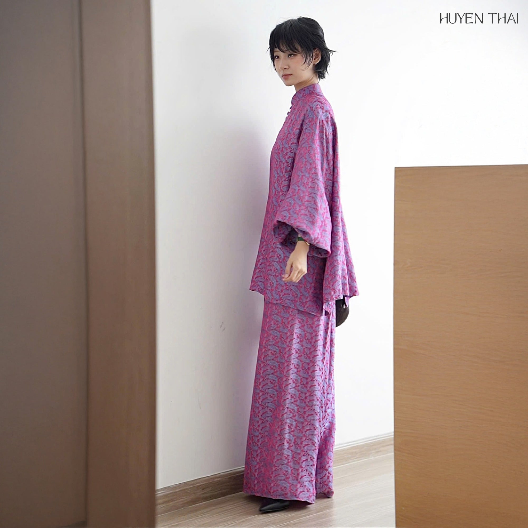 "KY Ao-Ngan Ao dai in violet pink wormsilk, modern jacquard pattern, Vietnamese artisan design"