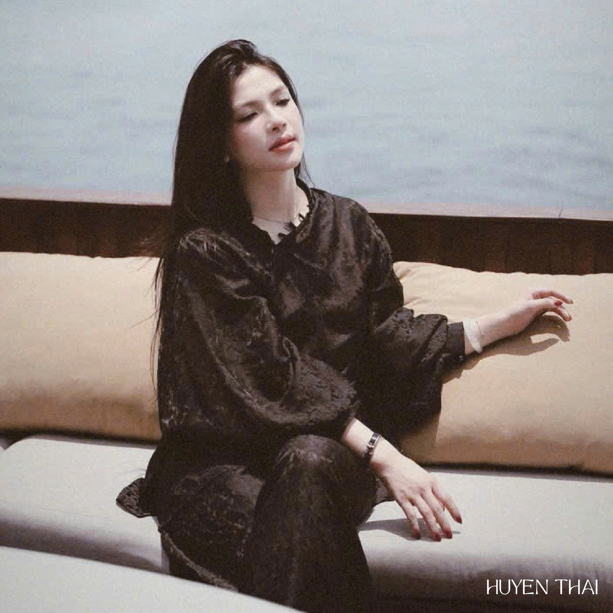 "KY Ao-Ngan black silk Ao dai by Huyen Collection, modern Vietnamese design"