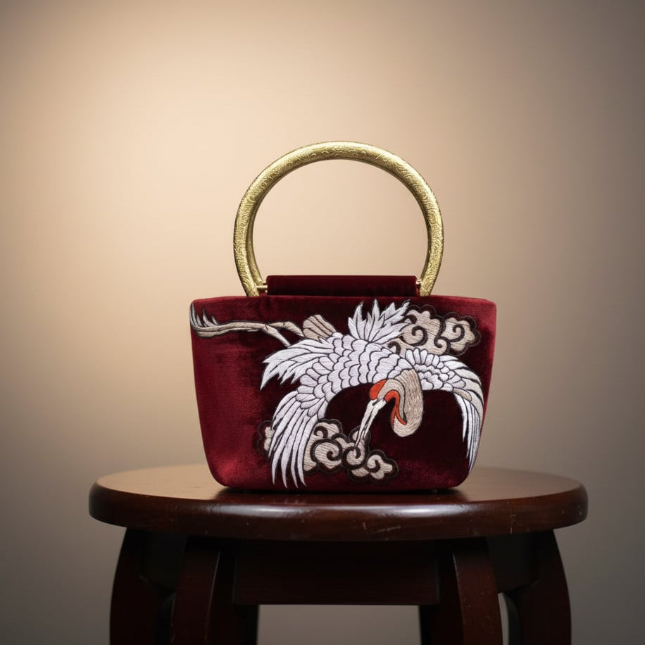 Vietnamese Embroidery - Hạc Vân - Embroidered Velvet Handbag with Hand-cast Brass Handle - front view in red by Tho