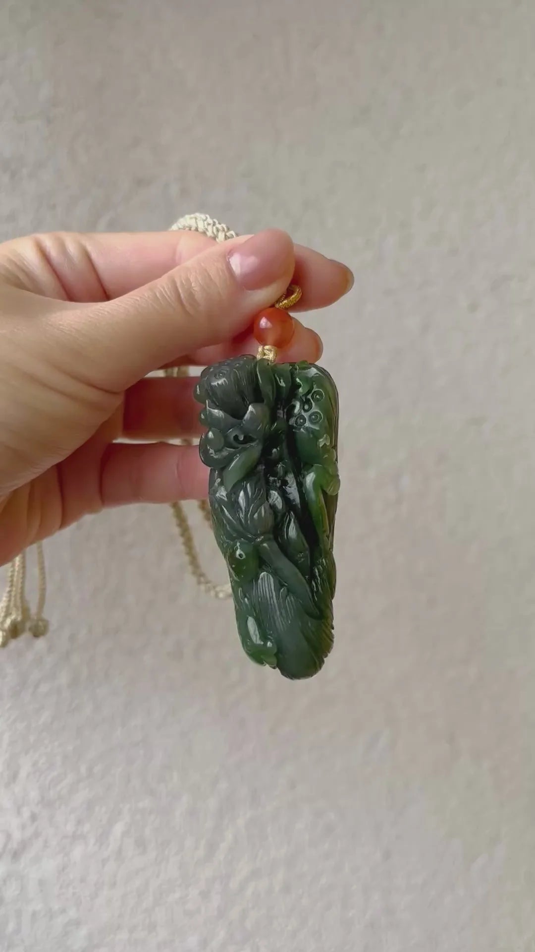 “Lotus Blessing ”- Hand Carved Green Hetian Jade Fish and Lotus Pendant, 手雕碧玉荷花鱼手把件 - detail close-up by L'Orient Haus