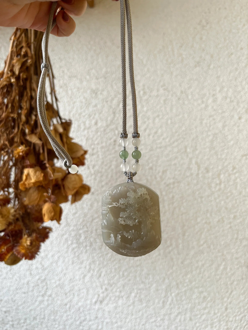 “Mist Valley Reverie” - Hand Carved Grayish Purple Hetian Jade Landscape | 和田烟紫山水 - detail close-up in white by L'Orient Haus