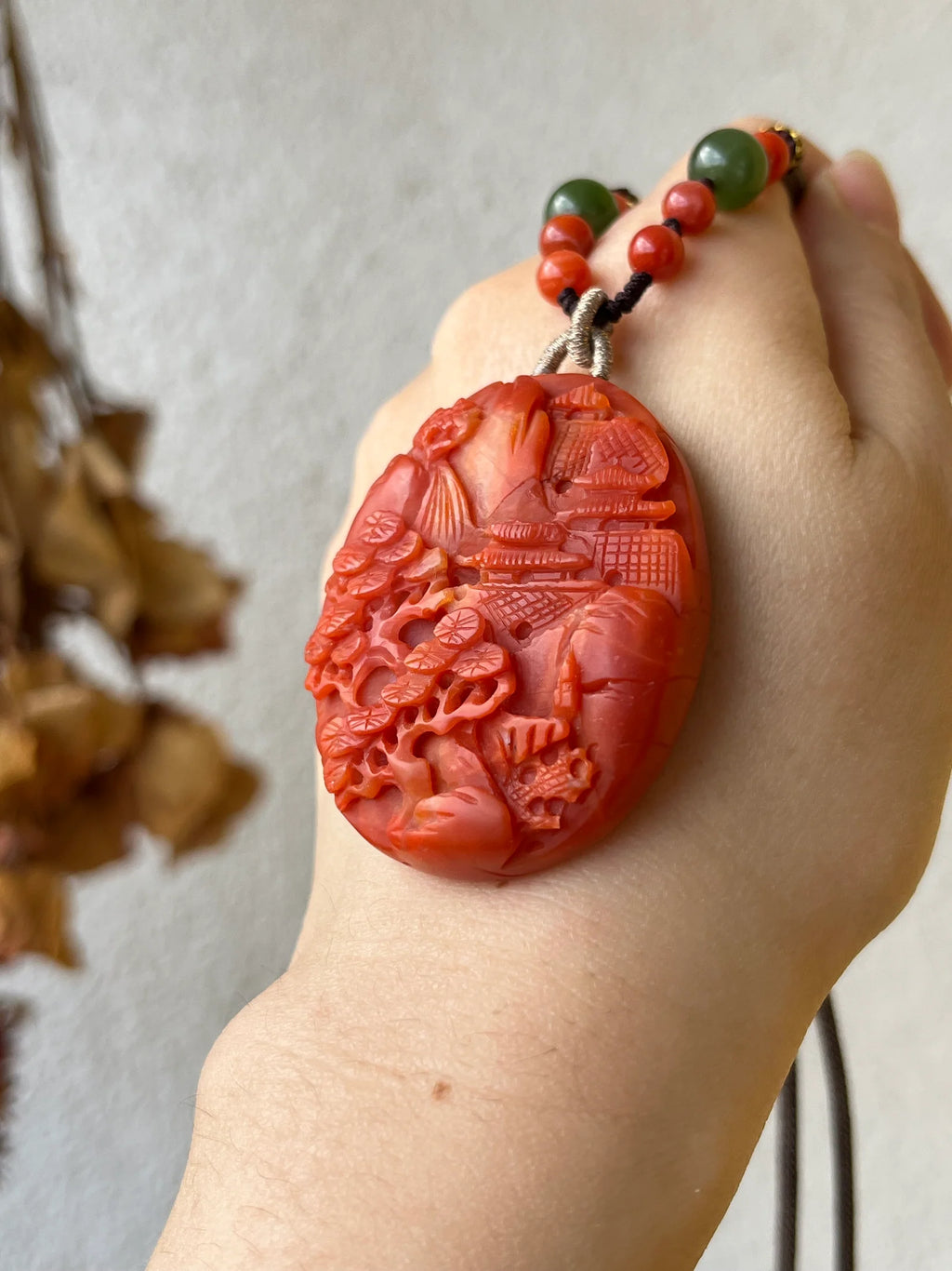 “Crimson Horizon” - Necklace with a Hand Carved Nanhong Agate Landscape Pendant, 手雕南红山水 - front view by L'Orient Haus