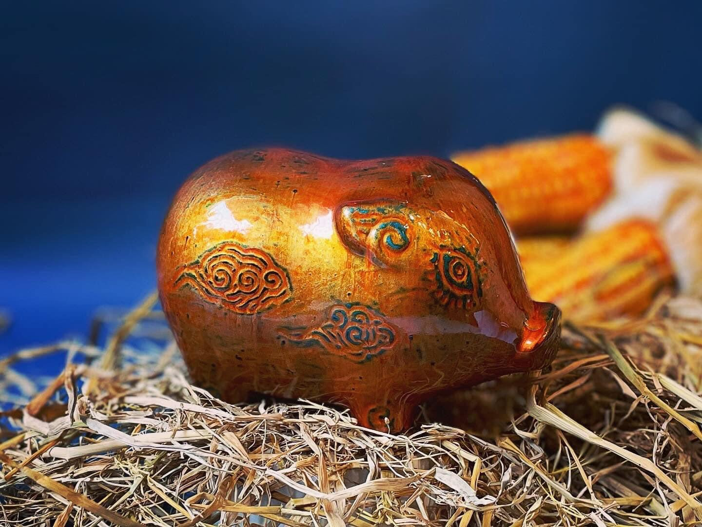 Vietnamese Lacquer - Ceramic Piggy in Lacquer - front view in orange by Lam Phong Pottery
