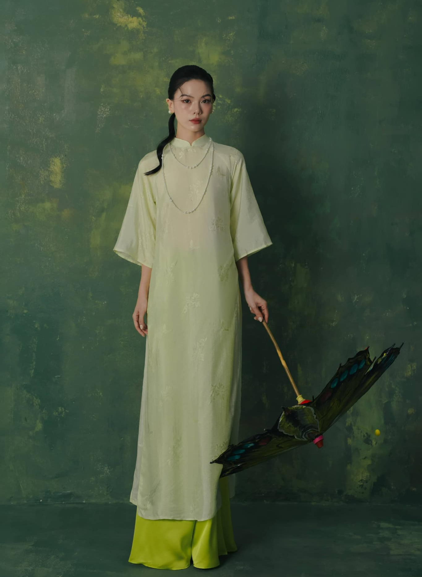 "Lan Ngoc Ao dai set in light avocado silk, traditional Vietnamese dress by Lalin"