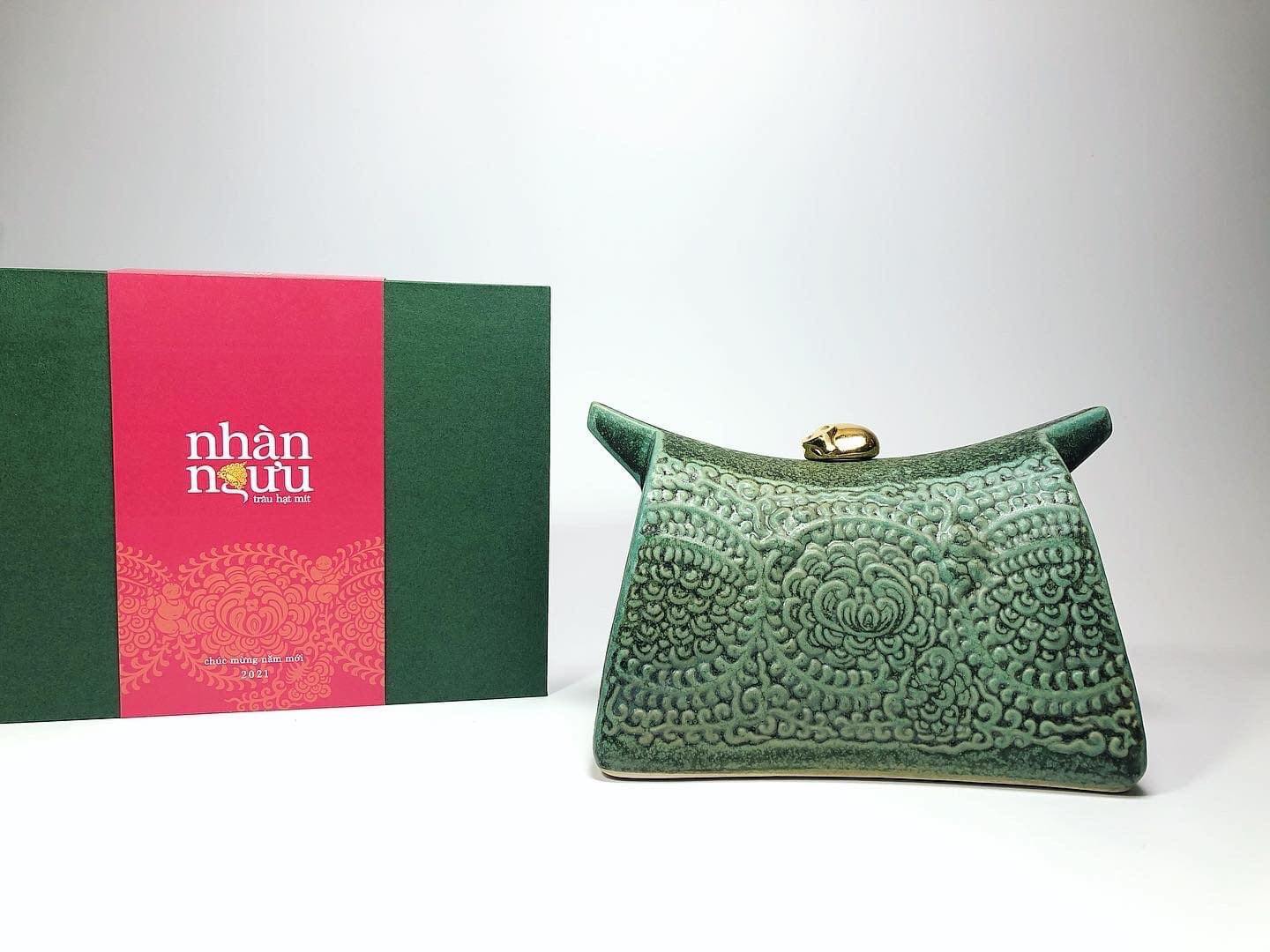 Vietnamese Lacquer - “Nhàn Ngưu” – Tranquil Buffalo Lacquer Sculpture - side profile in green by Lam Phong Pottery