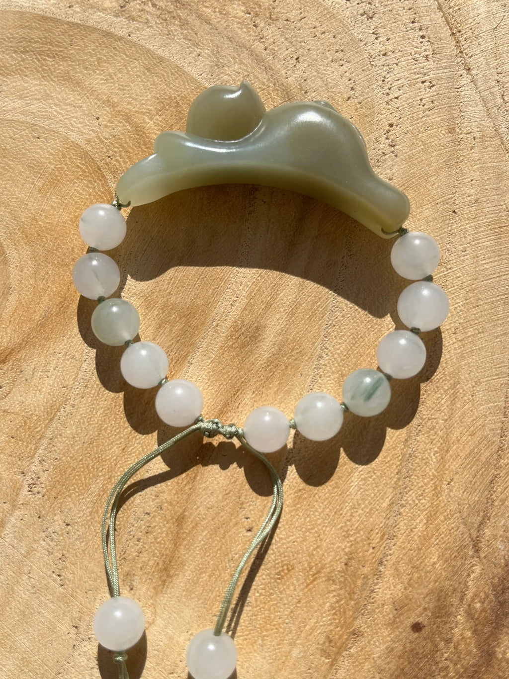 Fortune's Embrace – Nephrite Jade Lucky Cat Bracelet - flat lay display in green, white by L'Orient Haus