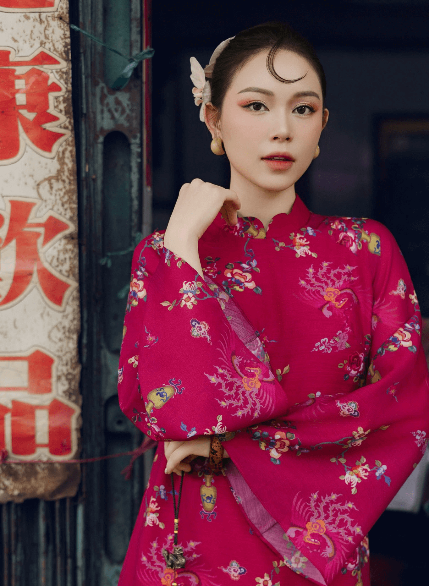 "Giang Chi Ao dai in magenta silk with floral print, traditional Vietnamese dress by Lalin."