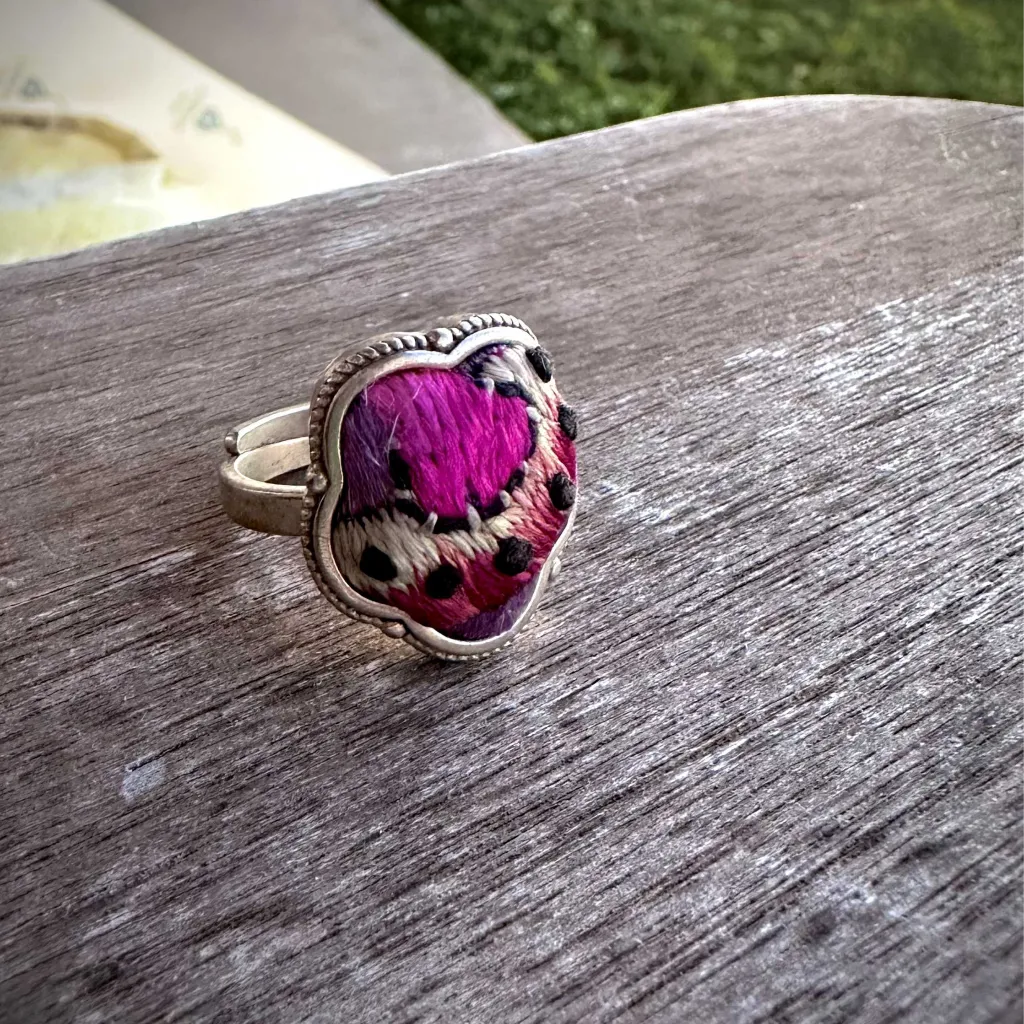 Midnight Bloom Miao ring close-up showing dark embroidery detail