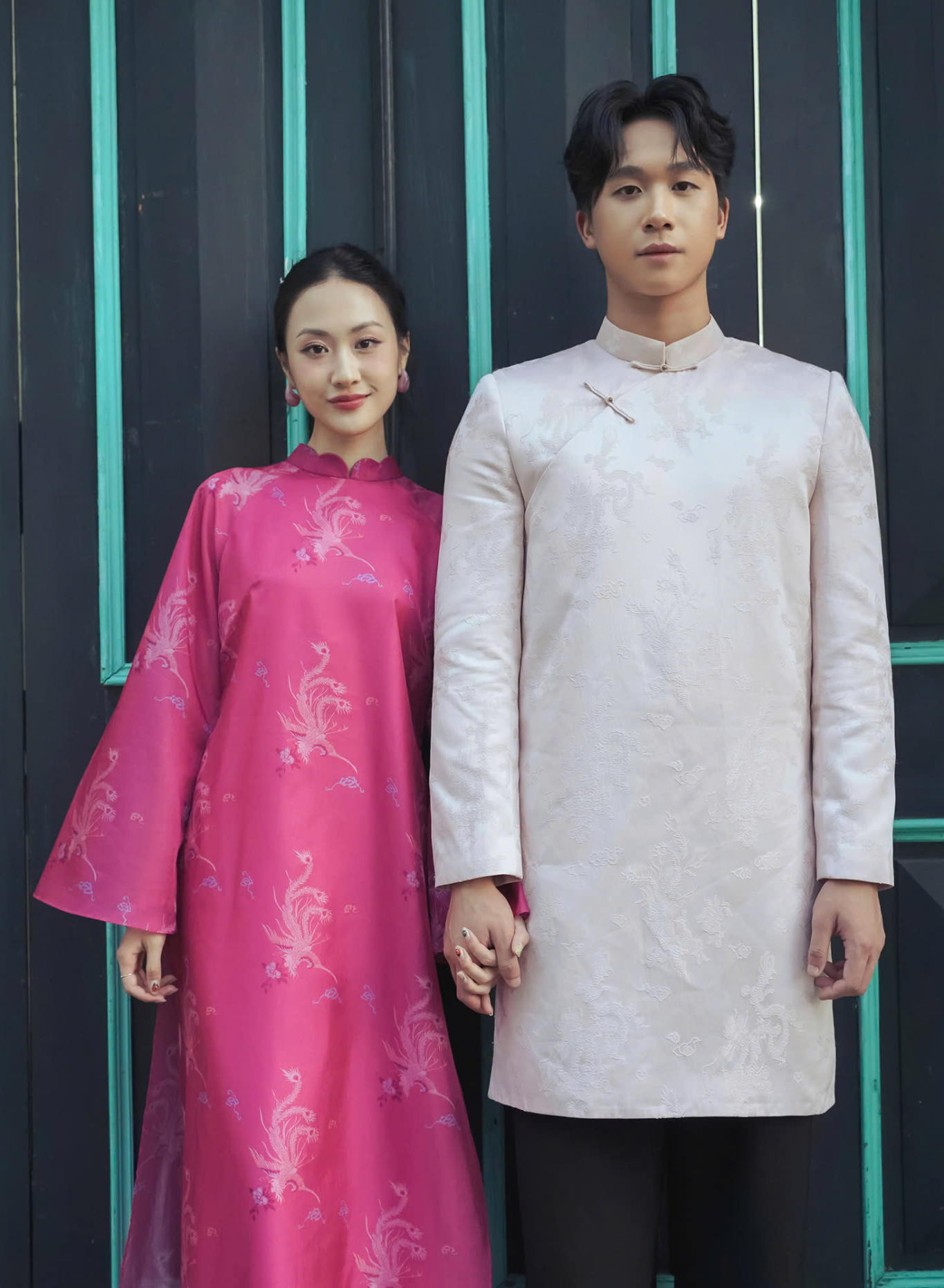 "Thy Loan Ao dai set in magenta wormsilk by Lalin, traditional Vietnamese dress with modern artisan design."