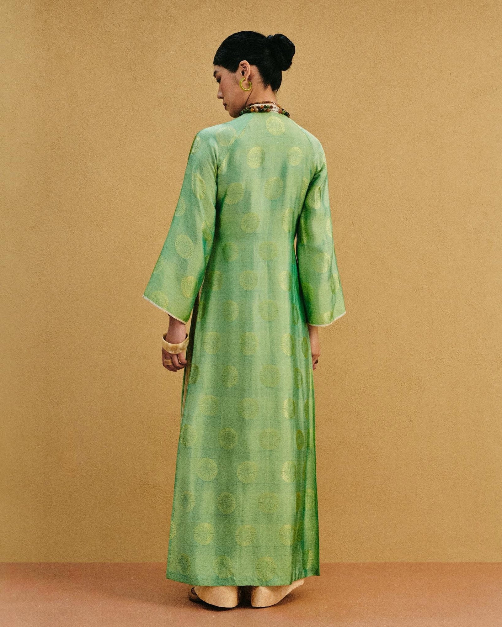 Vietnamese Ao Dai - Verdant Echo Ao Dai Set – Premium Jacquard Silk in Celadon - back view in green by Lo Boutique