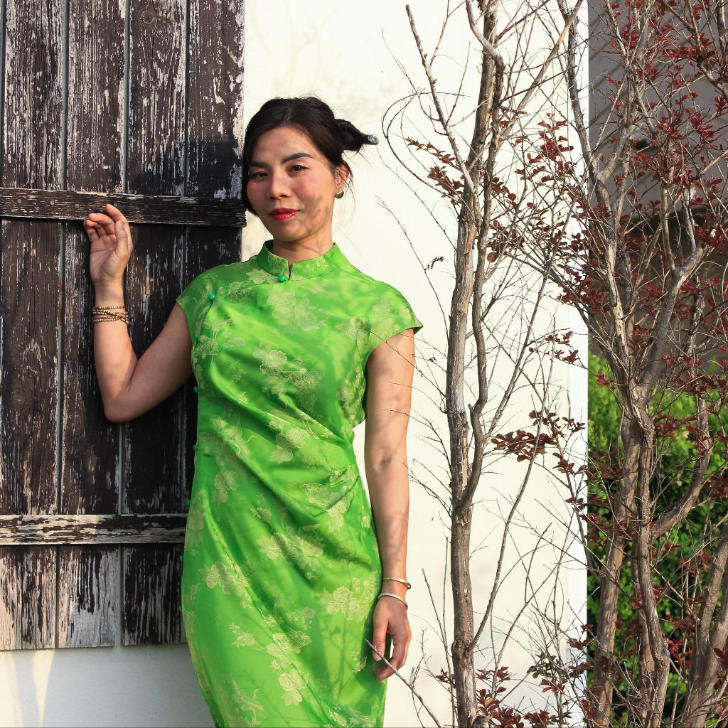 Vietnamese Ao Dai - Hương Trầm - Sleeveless Cheongsam in Green with Jacquard weave - front view in silk in green by Hy Phuong