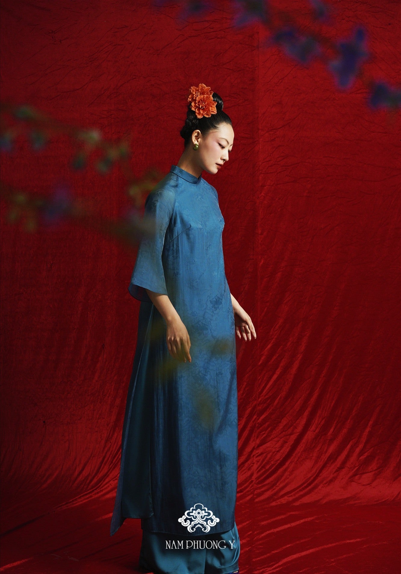 Vietnamese Ao Dai - Ho Phach - Royal Jacquard Silk Áo Dài Set in Deep Teal - side profile in blue by Nam Phuong Y