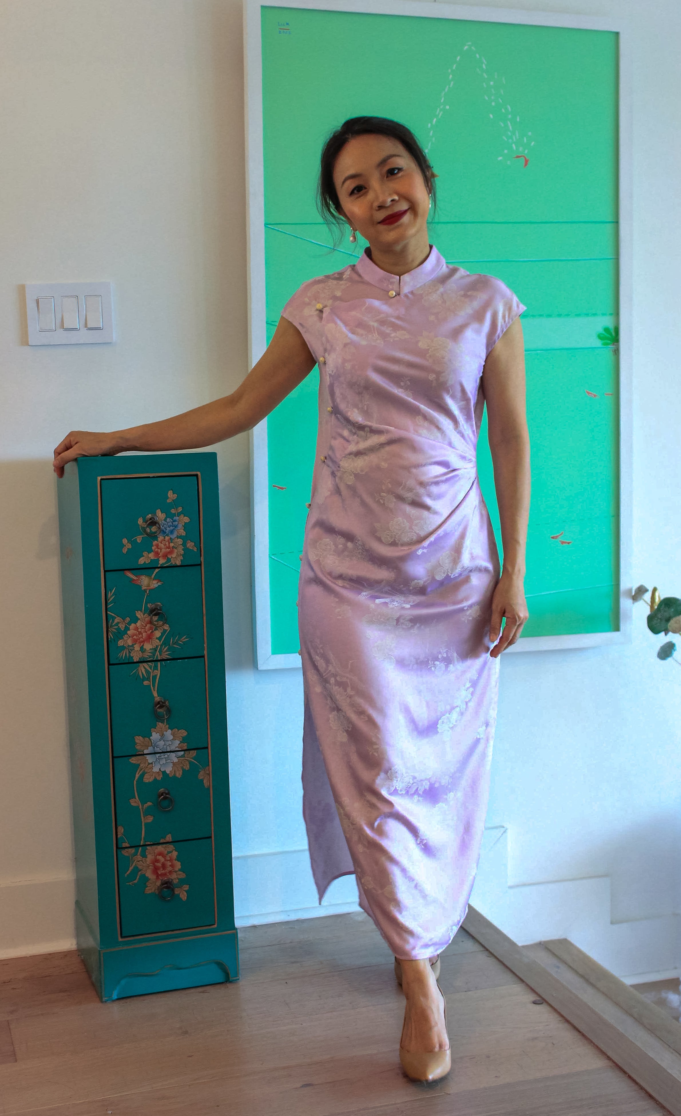 "Hương Trầm sleeveless cheongsam in lavender jacquard silk, modern Vietnamese design"