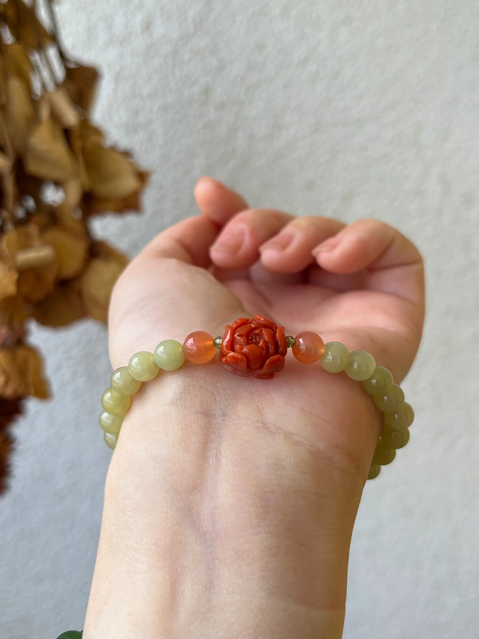 Traditional Motif - “Peony Bloom” – Hetian Jade & Agate Peony Bracelet - worn presentation in green by L'Orient Haus