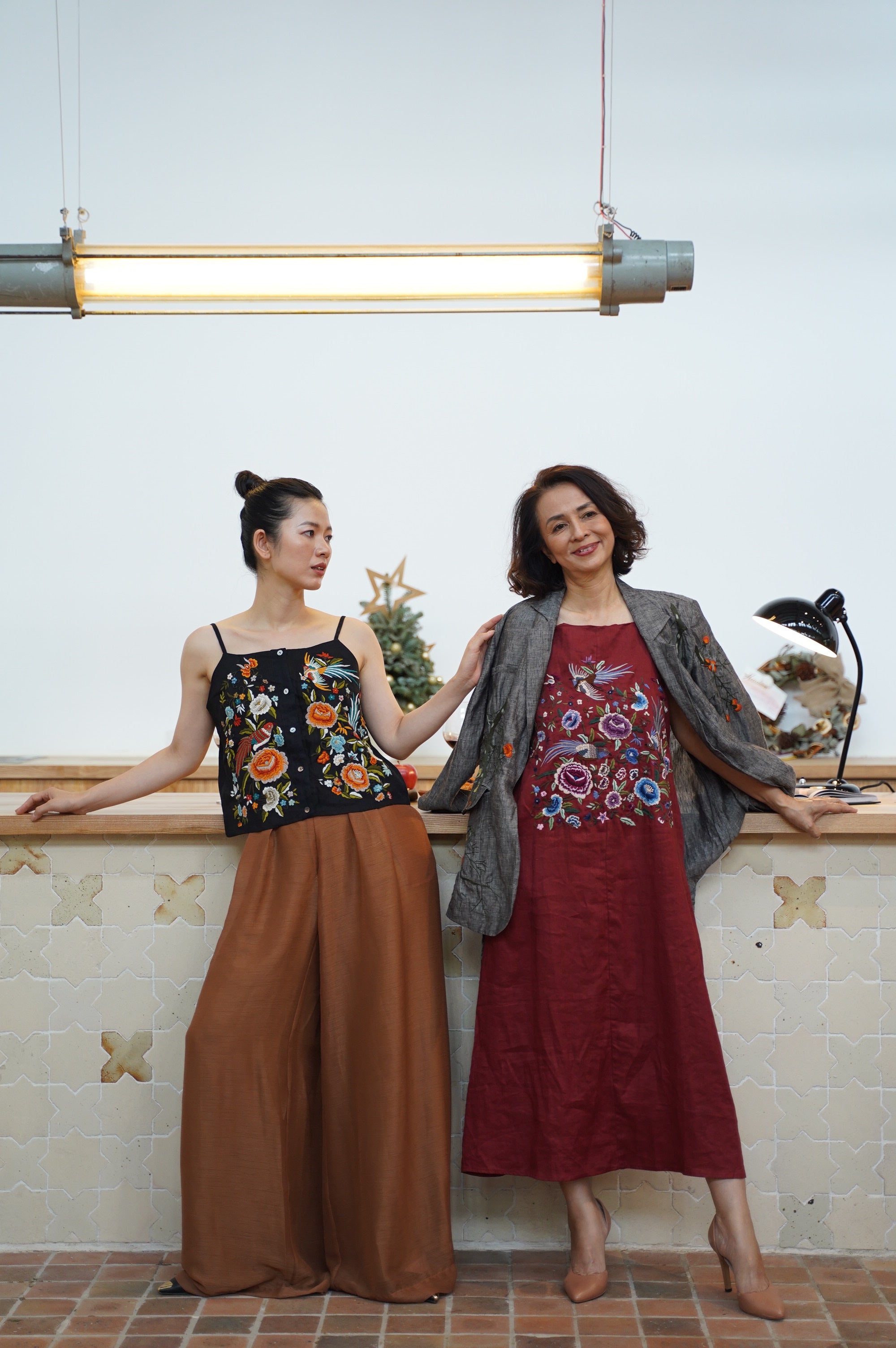 "Phoenix" embroidered maroon linen dress by Huulala, featuring artisan floral patterns, traditional ethnic design.