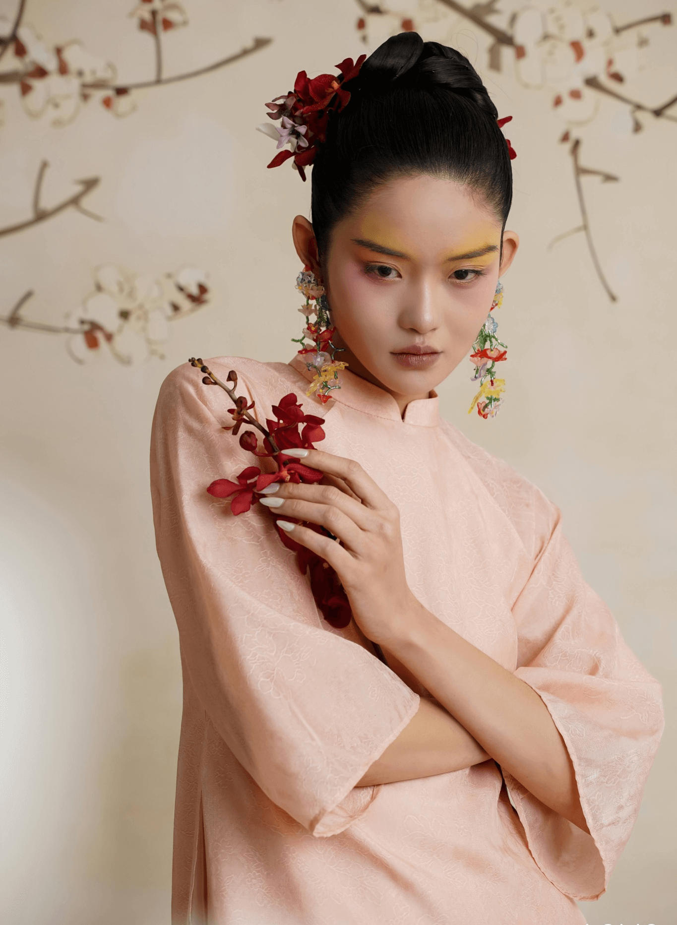 "Uyen My Ao Dai Set in salmon pink silk, traditional Vietnamese dress by Lalin, showcasing cultural heritage."