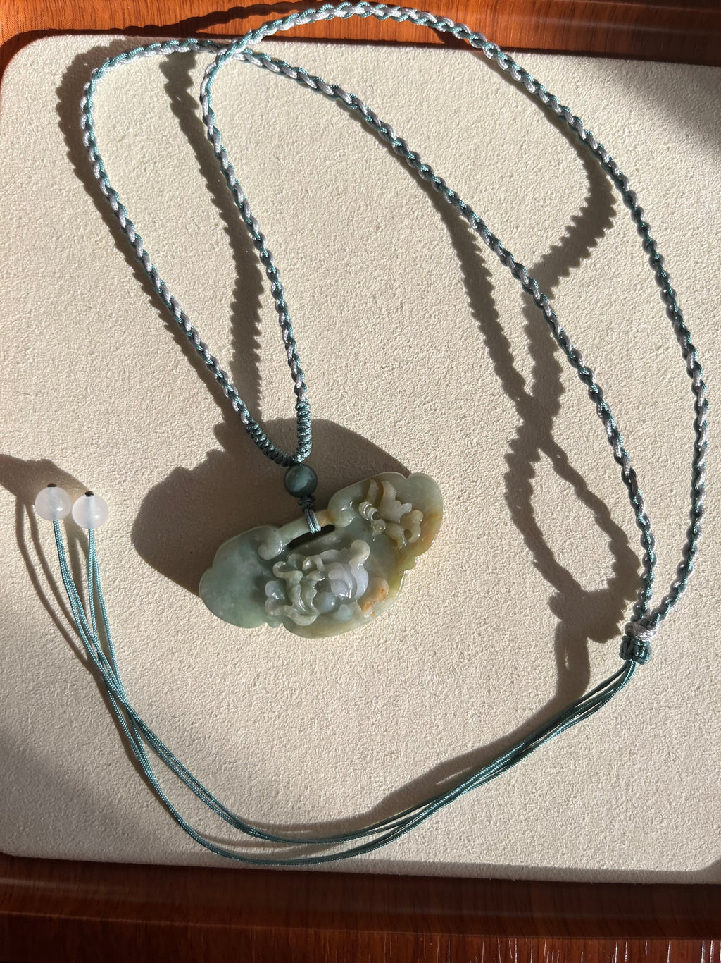 “Heirloom Wish” - Necklace Crafted from a Hand Carved Jadeite Peony Flower Ruyi Pendant - flat lay display by L'Orient Haus