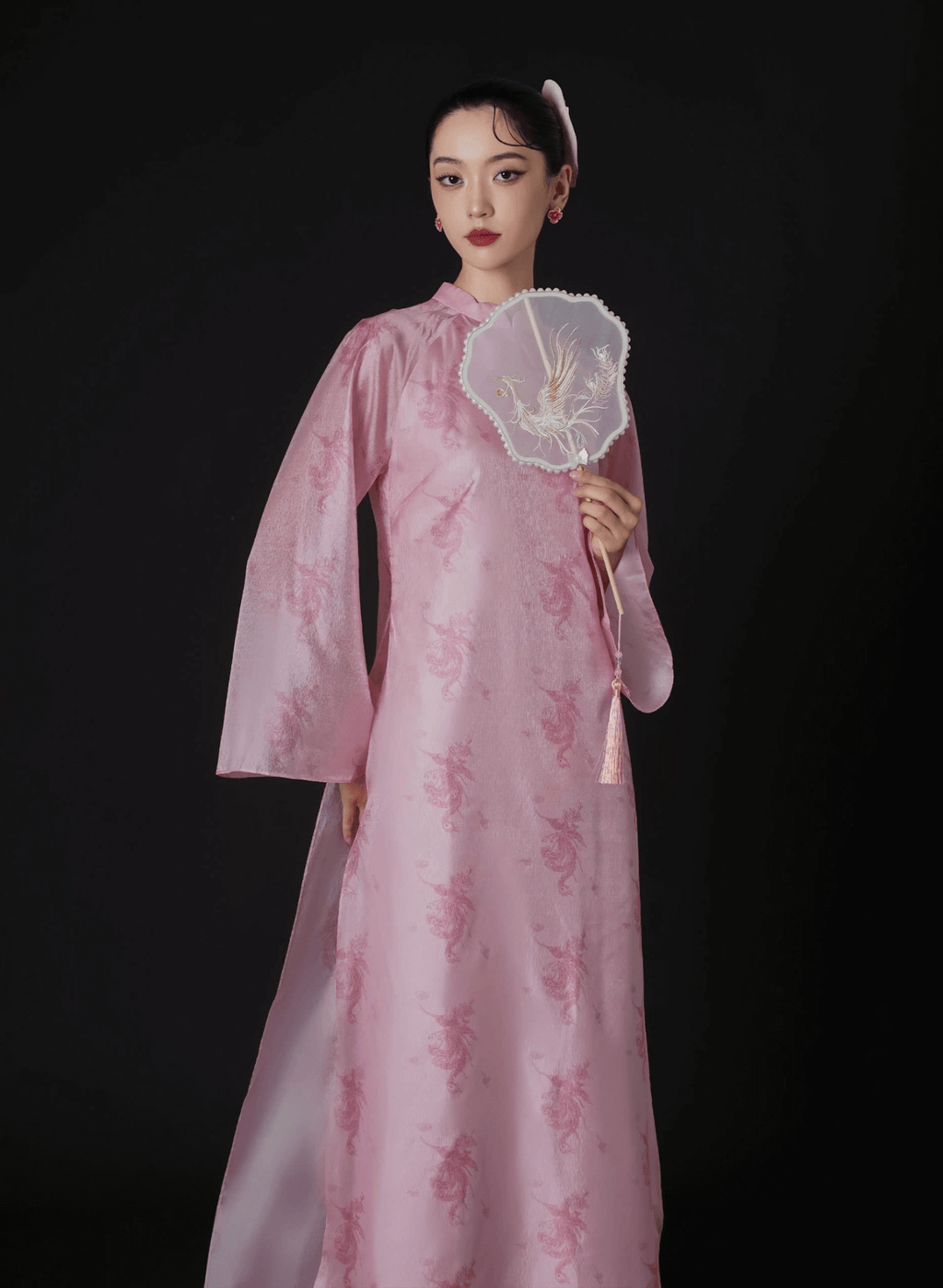 "Thy Loan Ao dai set in light pink silk, traditional Vietnamese dress by Lalin, modern pattern."