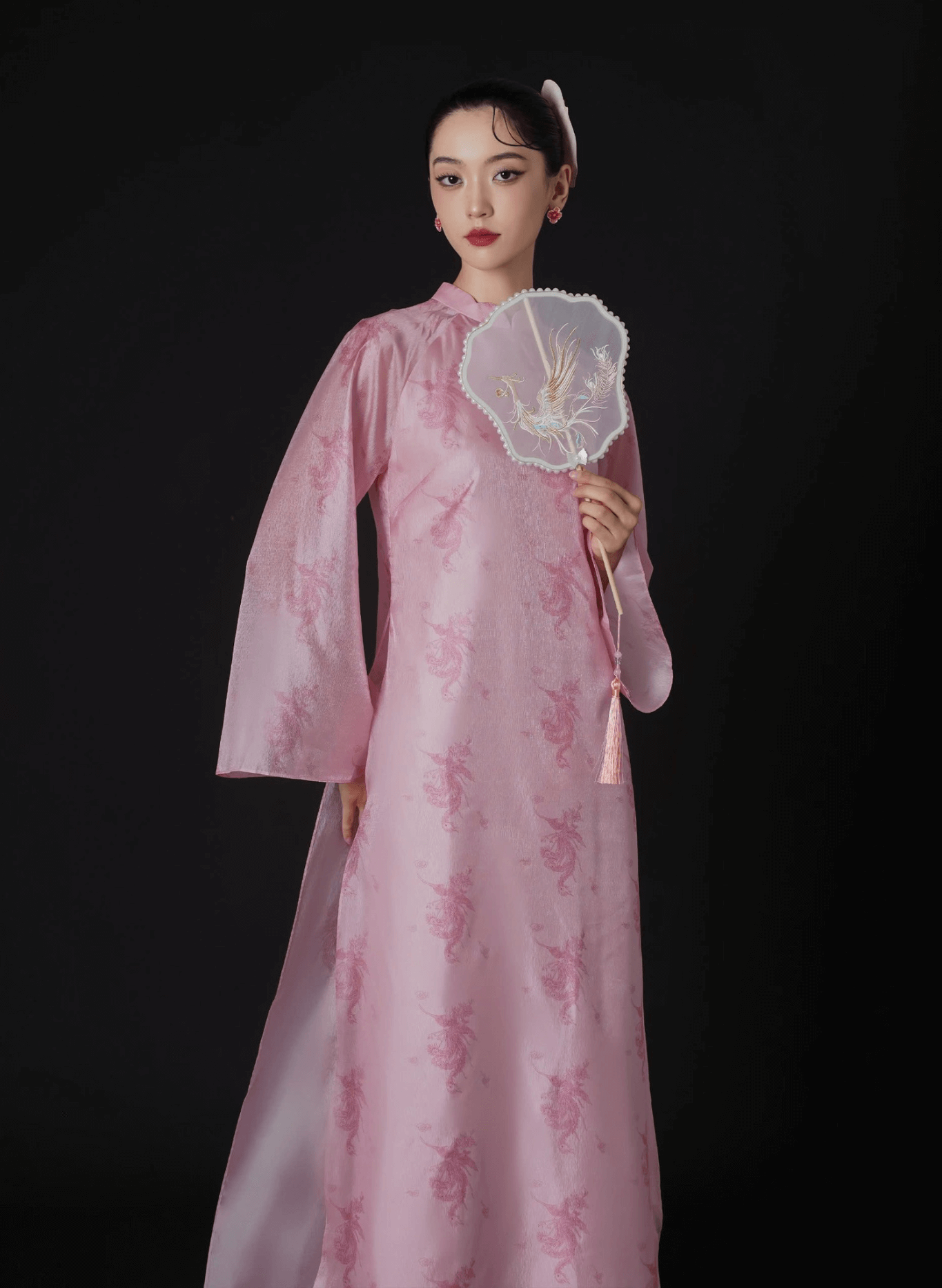 "Thy Loan Ao dai set in light pink silk, traditional Vietnamese dress by Lalin, modern pattern."