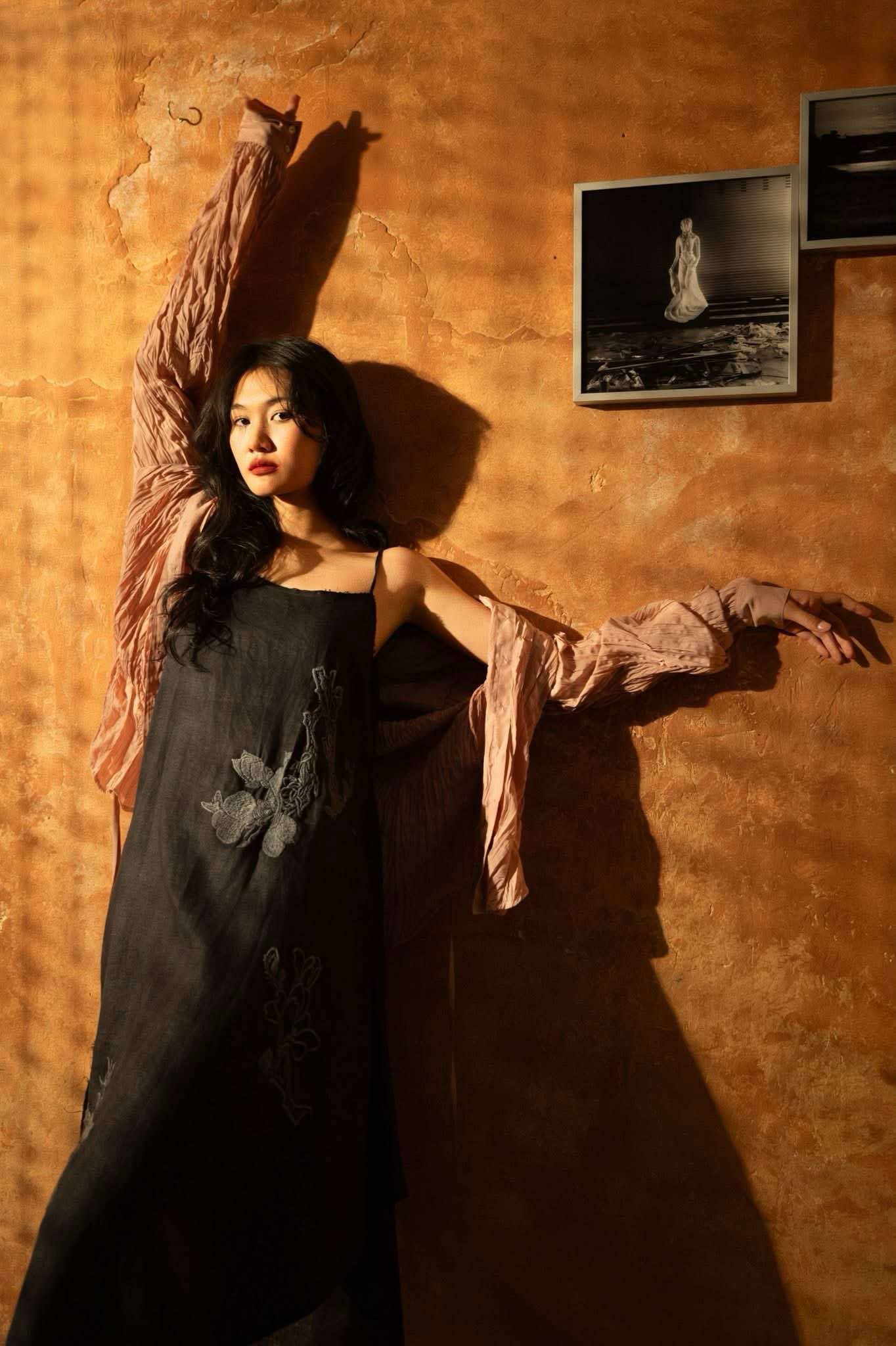 "Magnolia" embroidered linen slip dress in noir by Huulala, black floral pattern, elegant design.