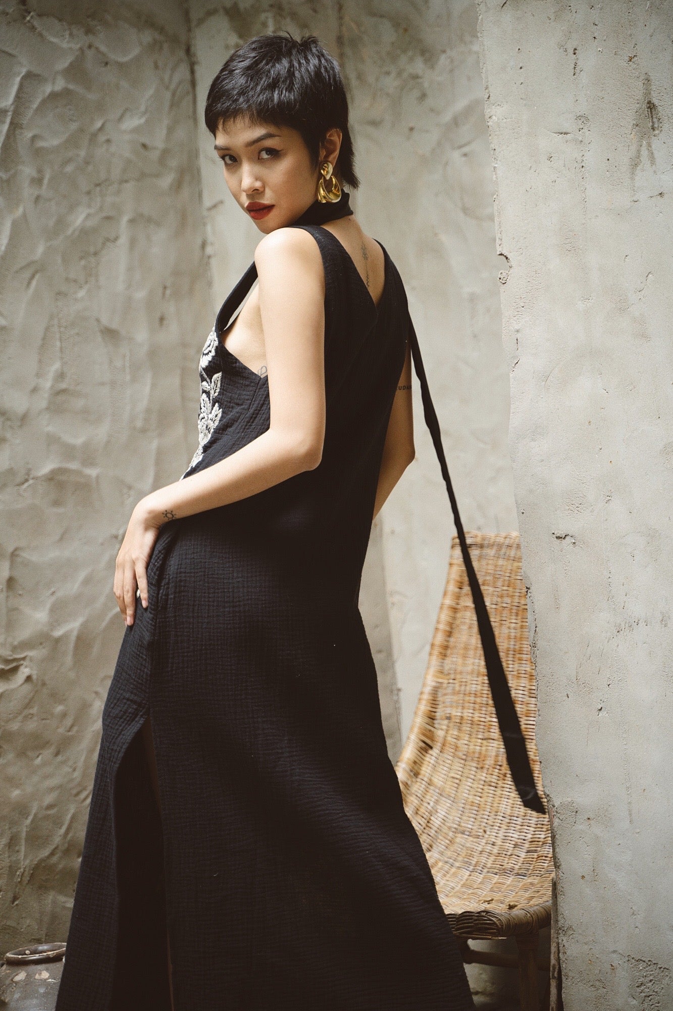 "Night Bloom" - Black embroidered V-neck muslin dress, artisan floral design, Vietnamese cultural style.
