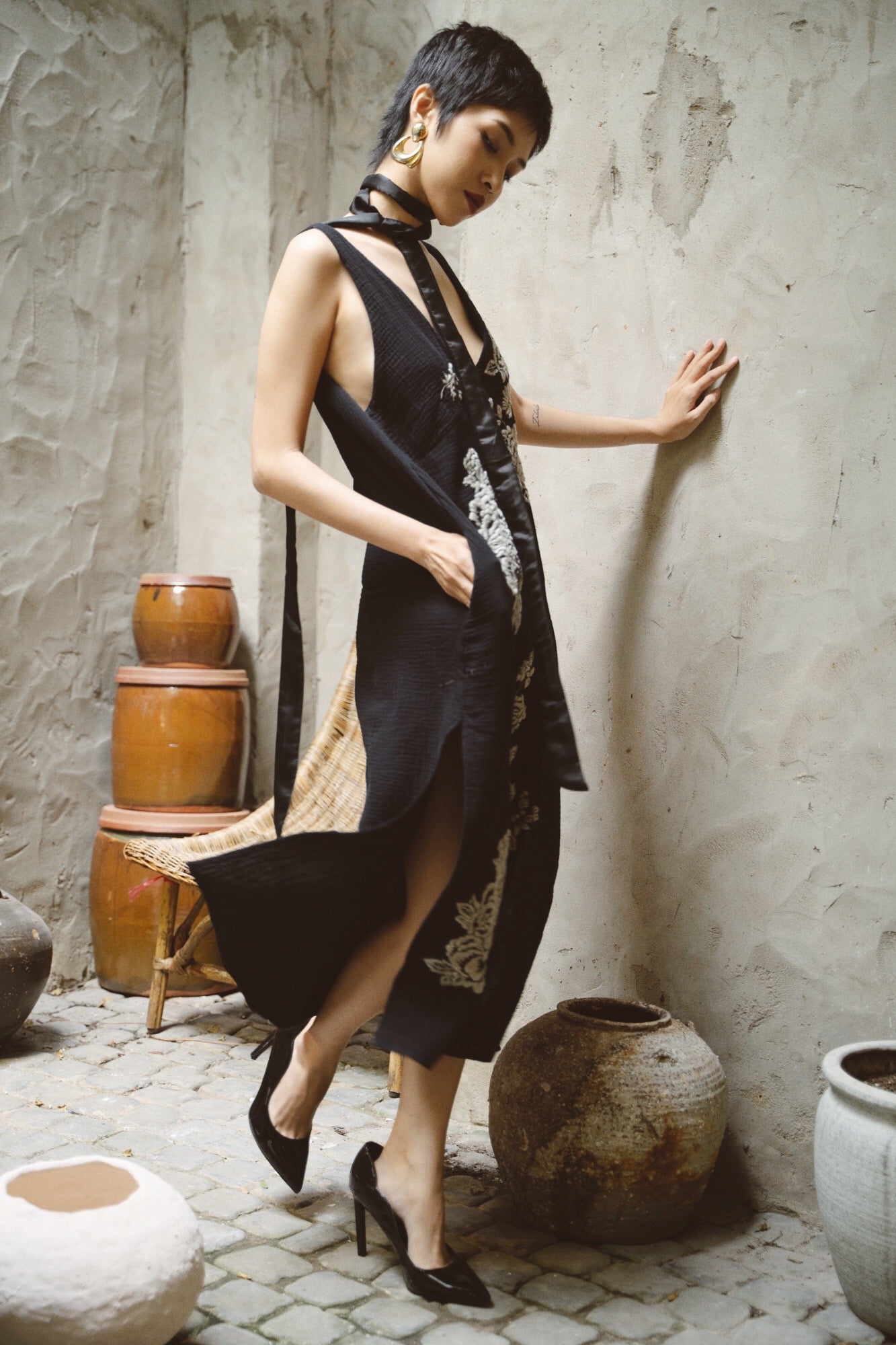 "Night Bloom" - Black embroidered V-neck muslin dress with floral pattern, showcasing Vietnamese artisan craftsmanship.