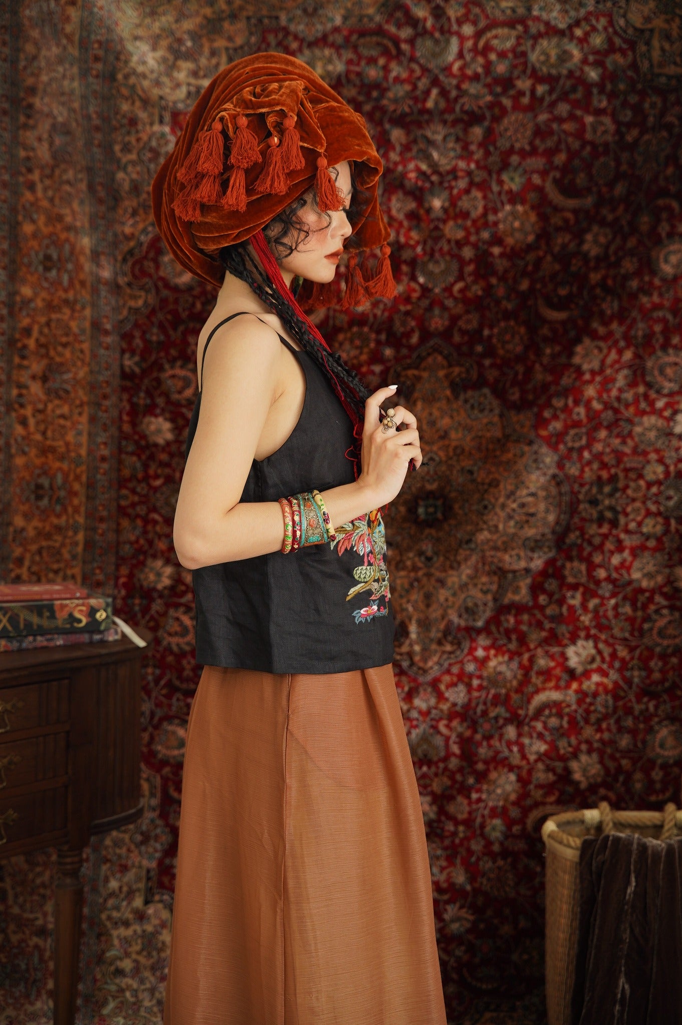 "Mai - Embroidered Linen Tank Top in black by Huulala, featuring floral patterns, ethnic style."
