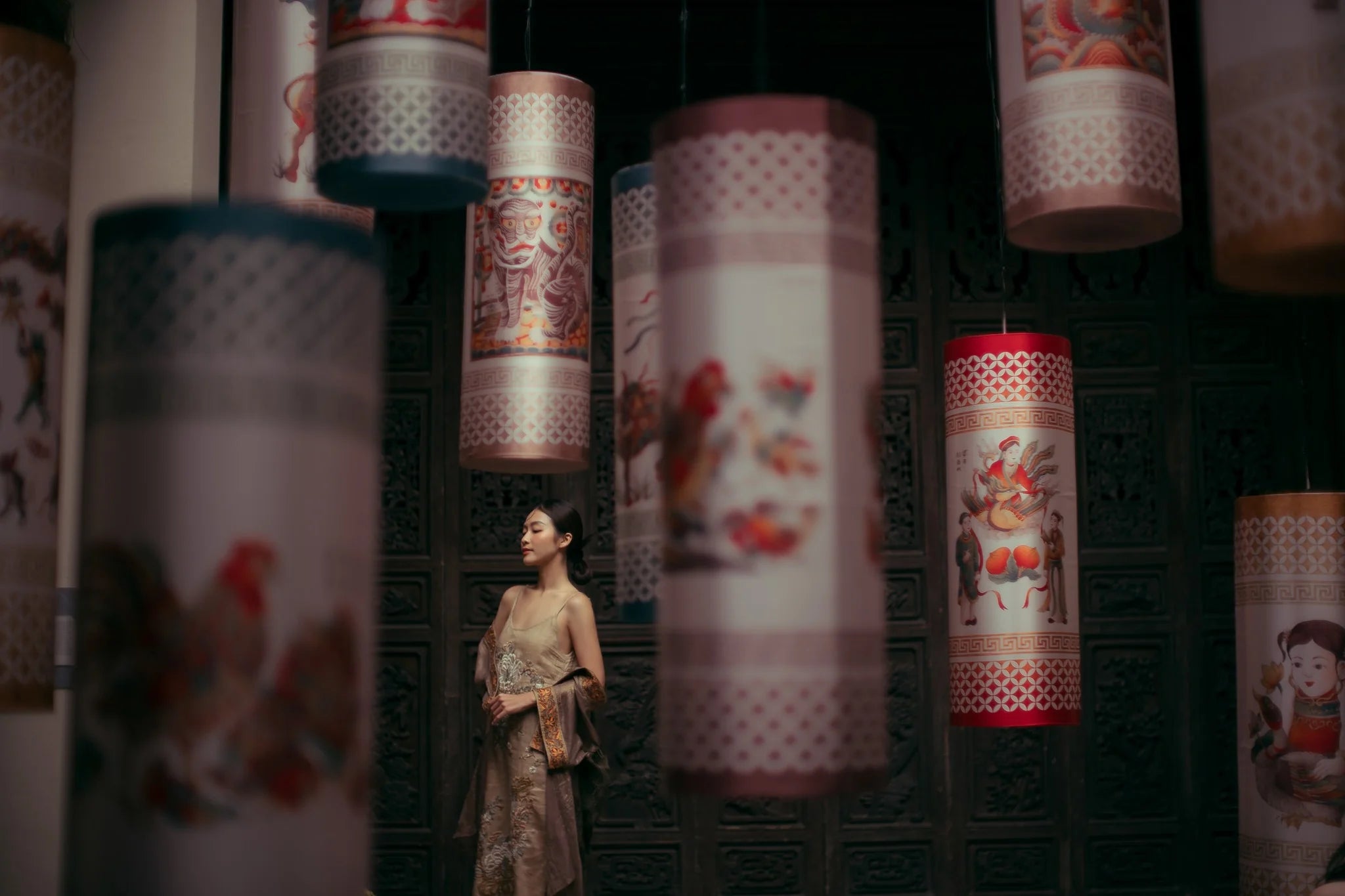 Banner image for the" About Us" page for L'Orient Haus. a candid picture of  a woman against oriental setting