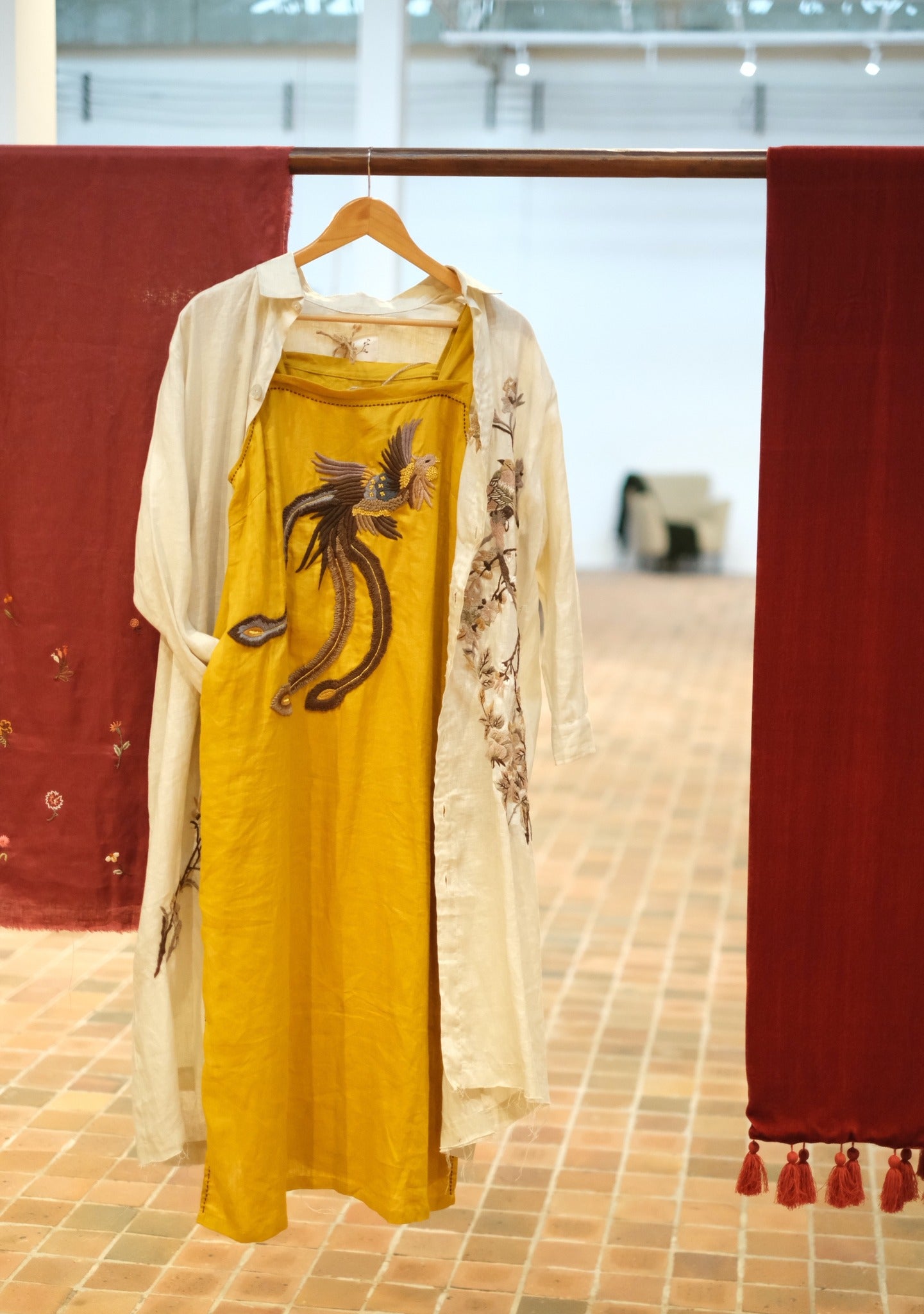 “Phoenix Aria” Embroidered Linen Dress in Black by Huulala - styled lifestyle shot demonstrating Vietnamese embroidered fashion, premium Vietnamese embroidered linen clothing