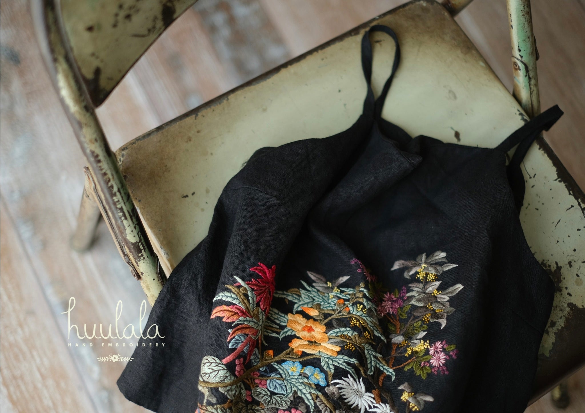 "Minh - Vietnamese hand-embroidered black linen tank top with colorful floral silk pattern by Huulala."