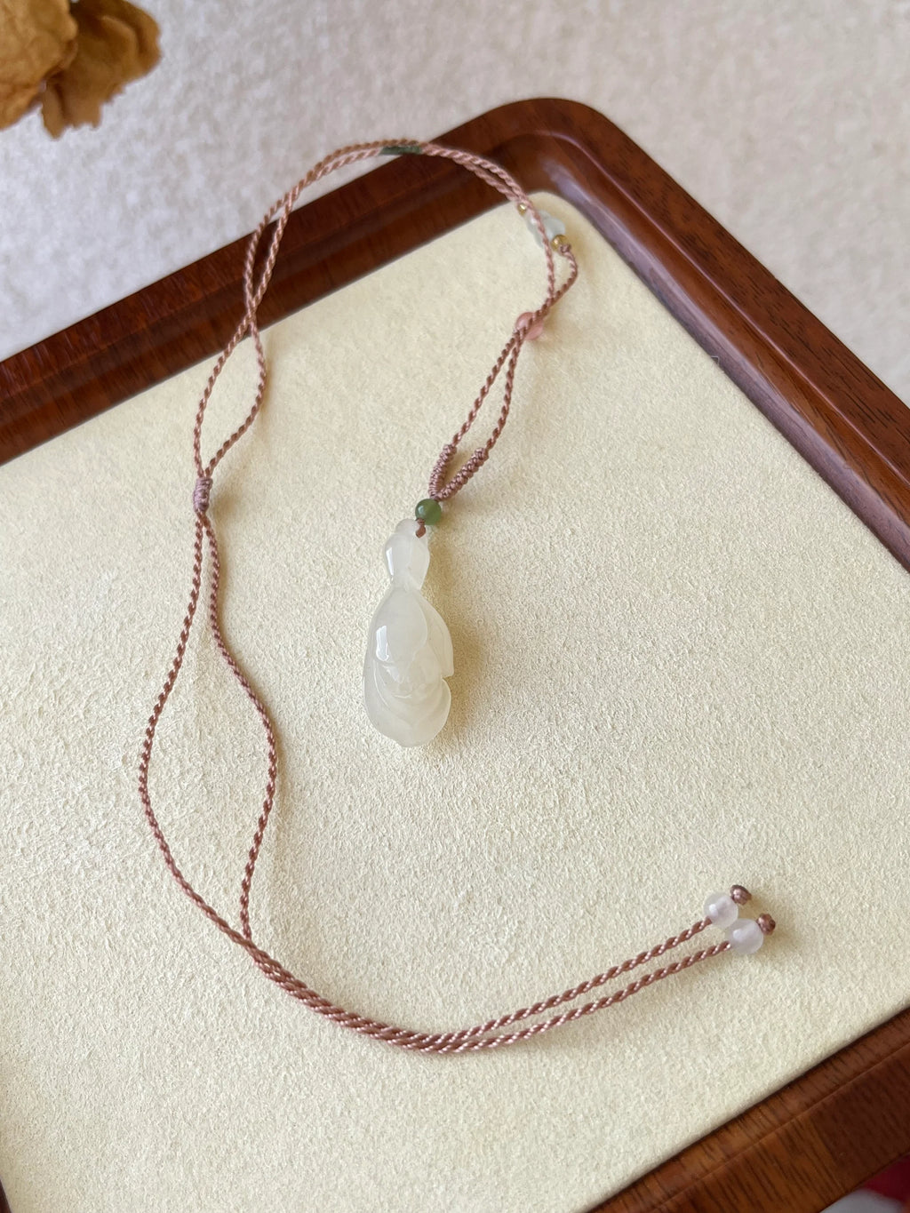 Blush Magnolia – Icy Pink Hetian Jade Pendant - flat lay display in #ffffff by L'Orient Haus