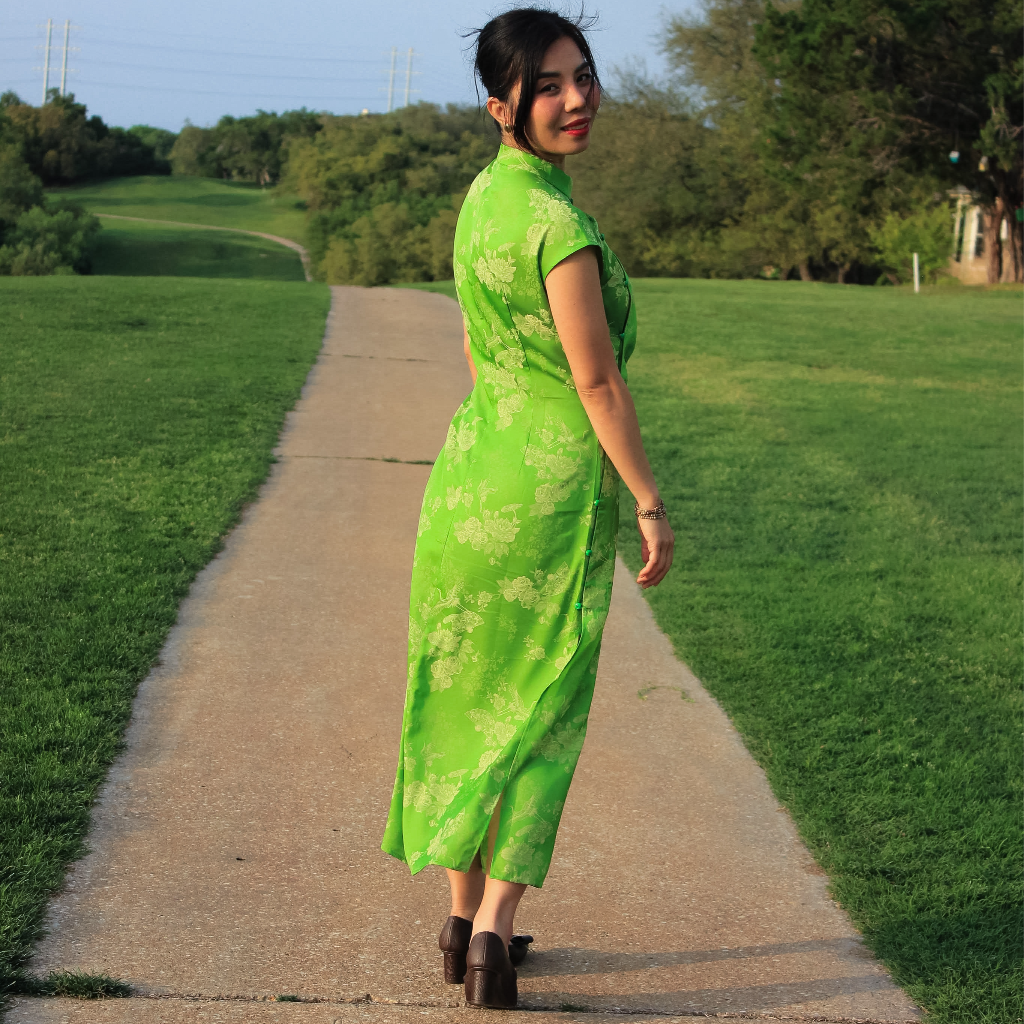 Hương Trầm - Sleeveless Cheongsam in Green with Jacquard weave - side profile by Hy Phuong