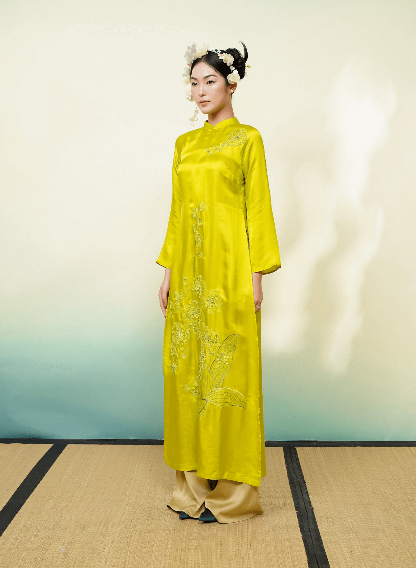 "Uyen Lan Embellished Ao Dai Set in Neon Green silk with floral pattern, traditional Vietnamese dress by Lalin."