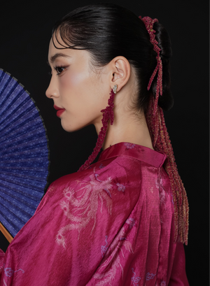 "Thy Loan Ao dai Set in magenta wormsilk by Lalin, traditional Vietnamese dress with modern pattern, cultural authenticity."