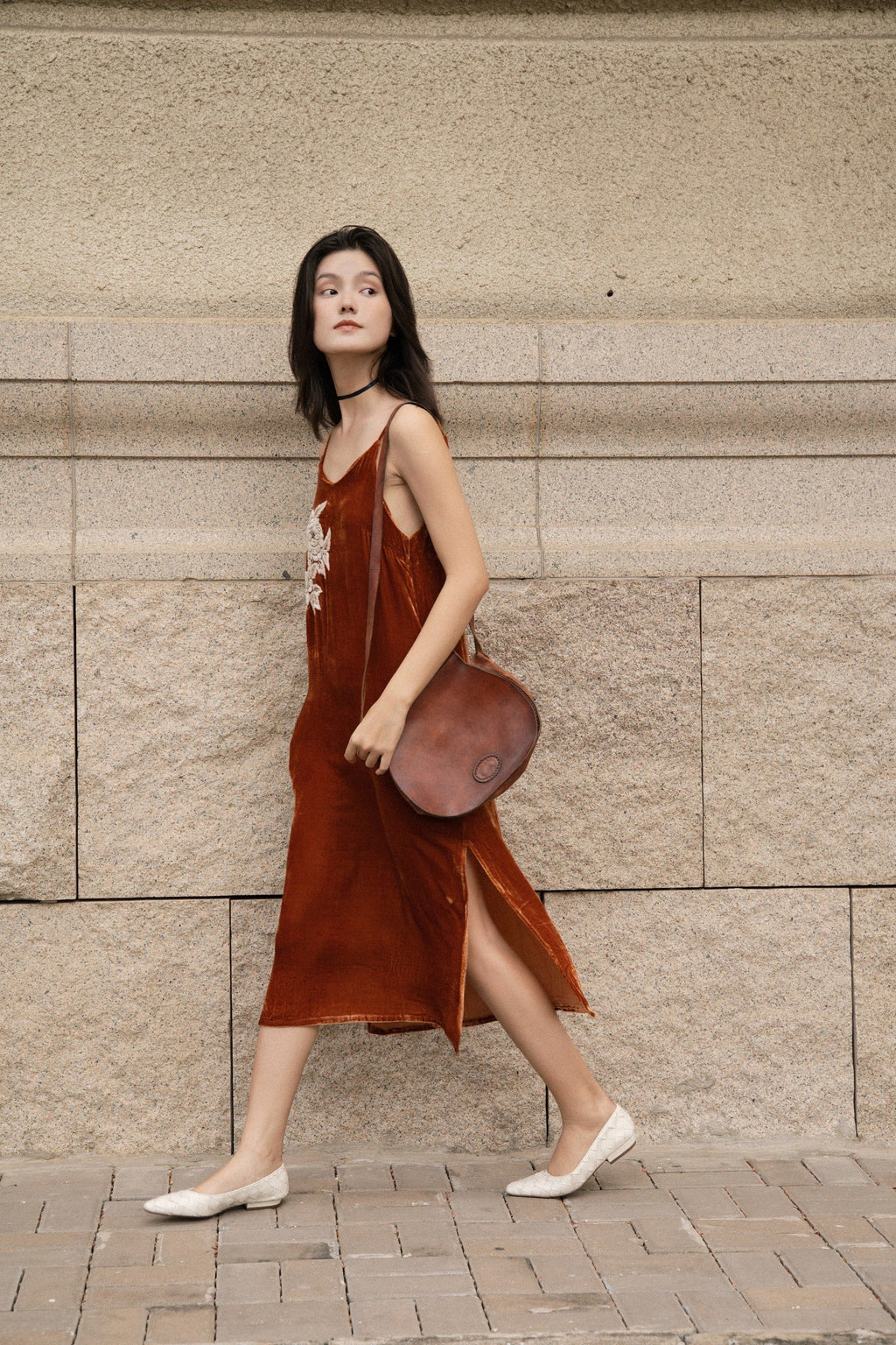 "Rumi embroidered suede tank-top dress in orange by Huulala, featuring white floral embroidery, elegant and modern design."
