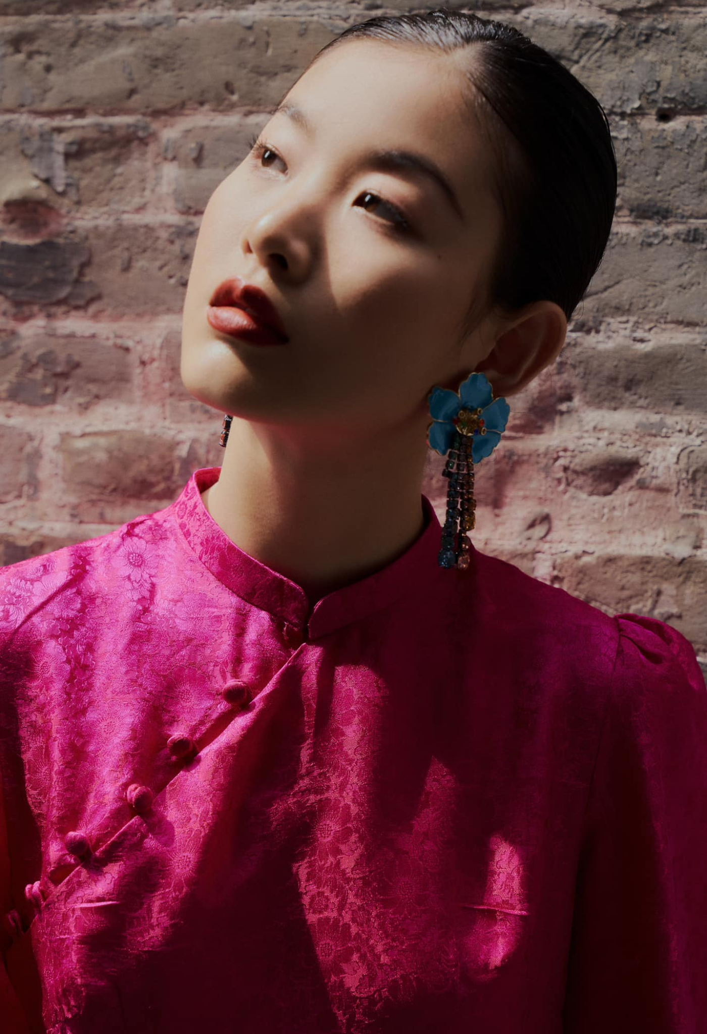 "Tang Bong Ao Dai Set in magenta silk with puff sleeves, floral jacquard pattern, traditional Vietnamese design by SY Design."