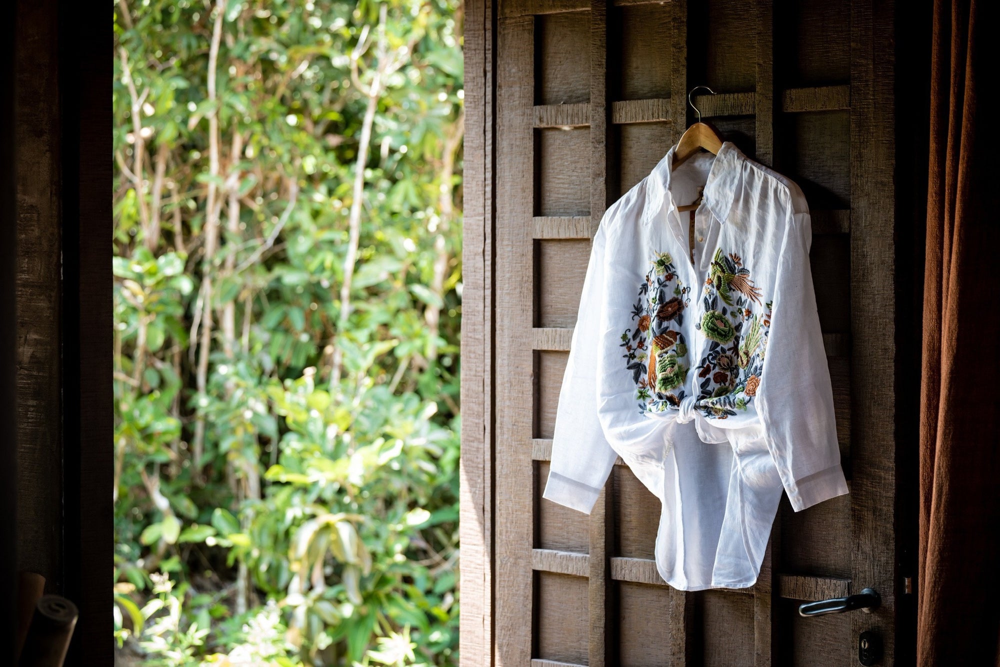 "Zoya embroidered linen shirt in white with yellow moss tone floral design, Vietnamese style by Huulala"
