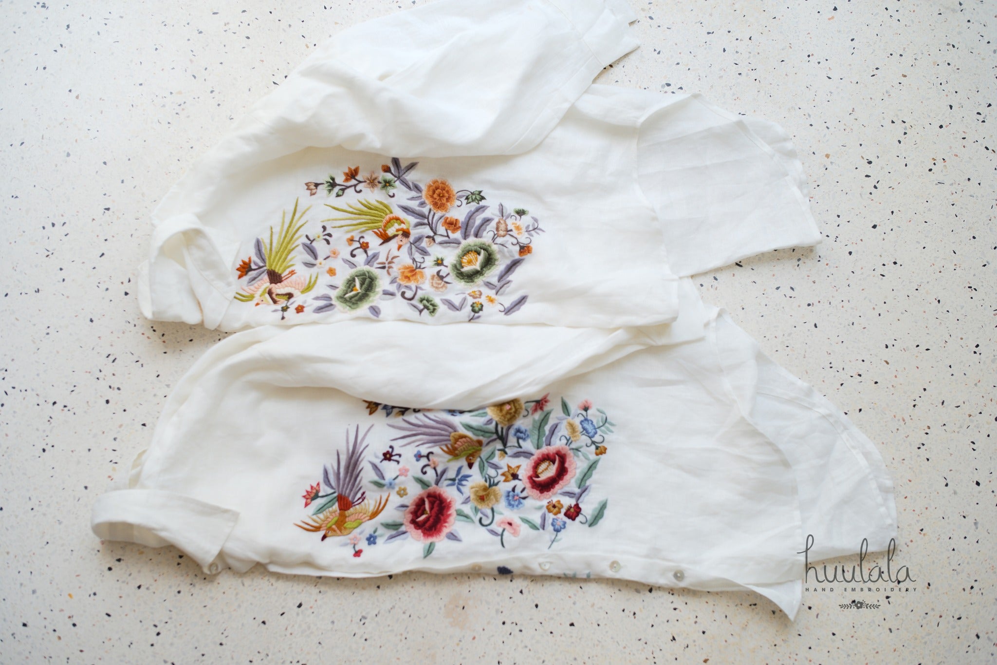 "Zoya embroidered linen shirt in white with pink floral design, Vietnamese cultural authenticity by Huulala"