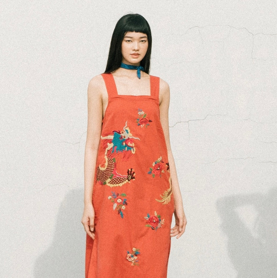 "Dreaming Dragon embroidered linen dress in brick red with floral patterns, Vietnamese artisan design by Huulala."