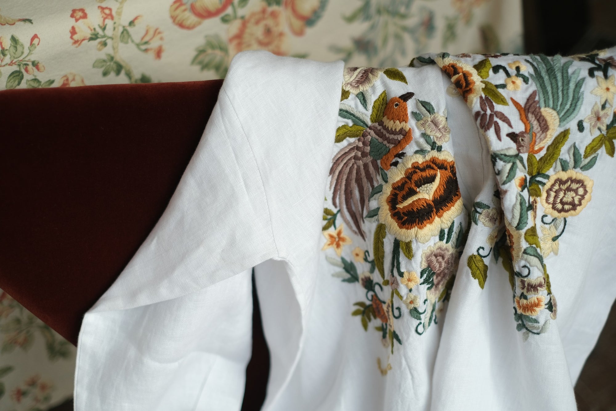 "Zoya embroidered linen shirt in white with yellow moss tone floral embroidery, Vietnamese design by Huulala"