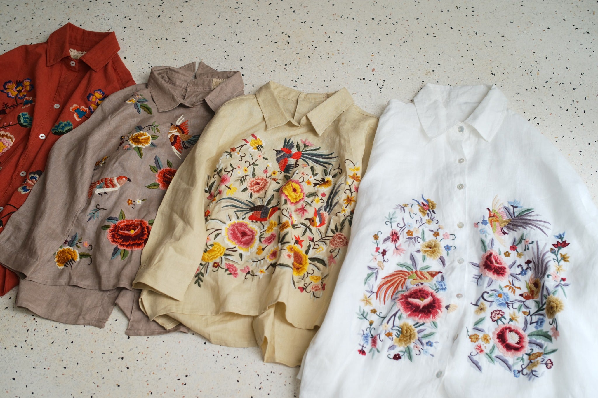 "Zoya embroidered linen shirt in white with pink floral embroidery, Vietnamese design by Huulala."