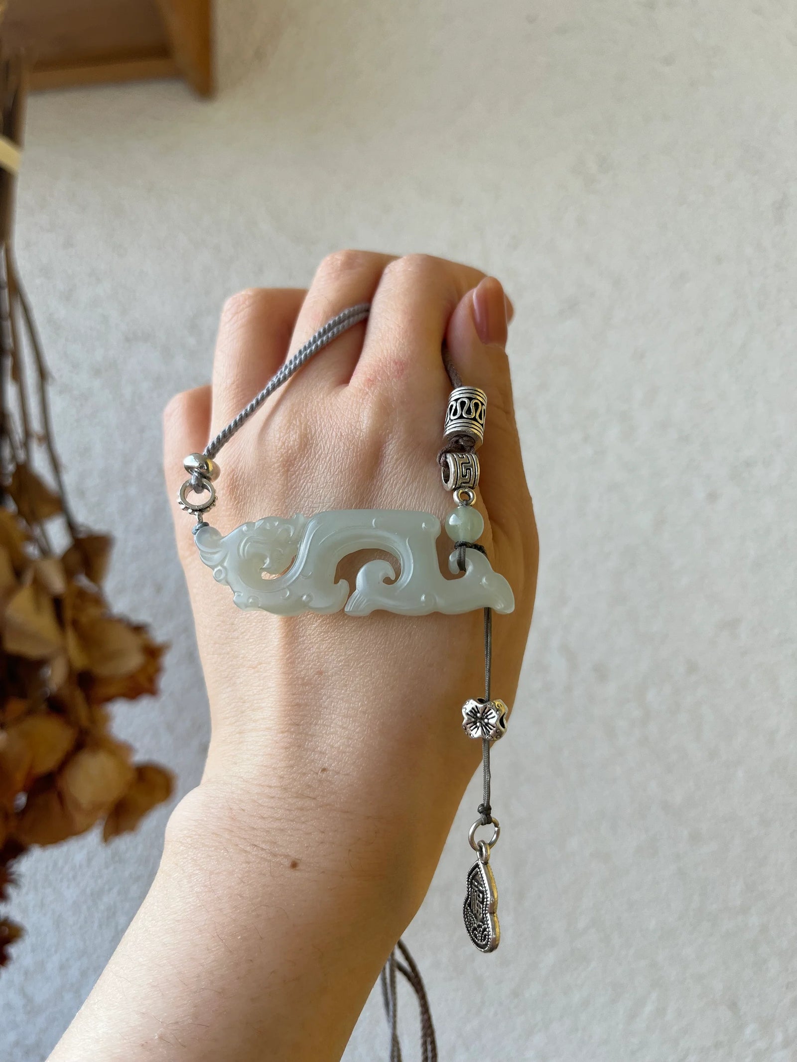 Traditional Motif - Celestial Dragon – Hand-Carved Nephrite Jade Necklace - worn presentation in white by L'Orient Haus