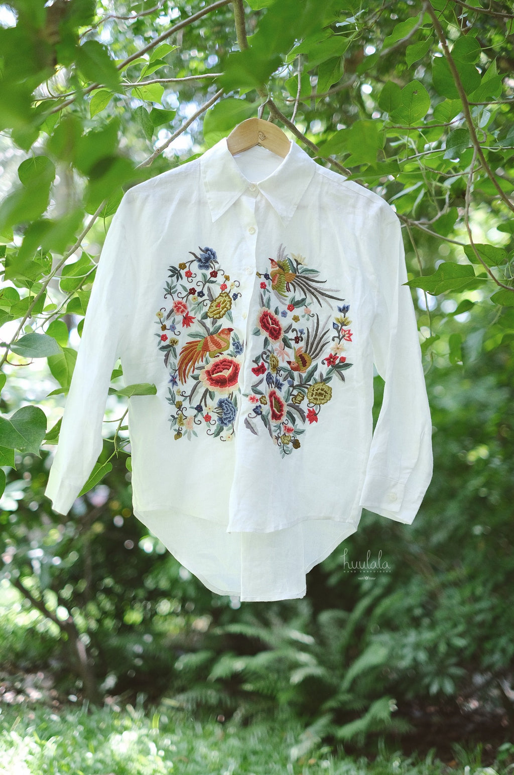 "Zoya embroidered linen shirt in white with pink floral design, Vietnamese cultural fashion by Huulala"