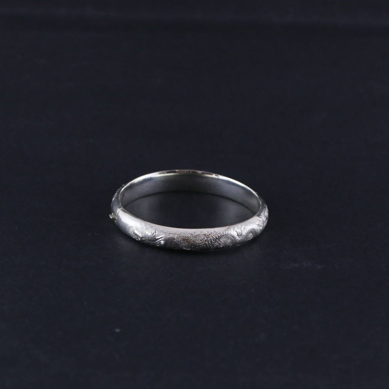 Long Ẩn Bangle – The Hidden Dragon Bangle - side profile in silver by HI de Maison
