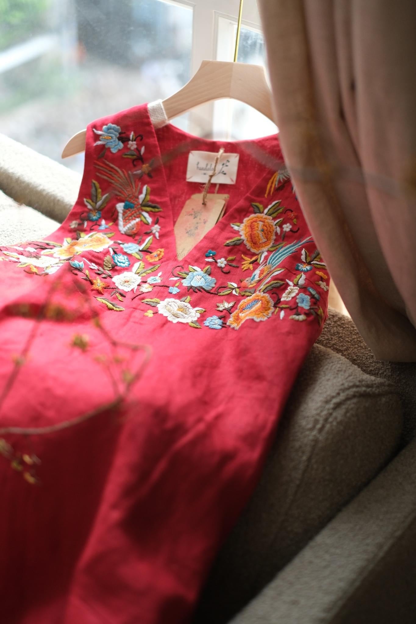"Phoenix and Flowers" embroidered V-neck red linen dress, Vietnamese artisan floral design.