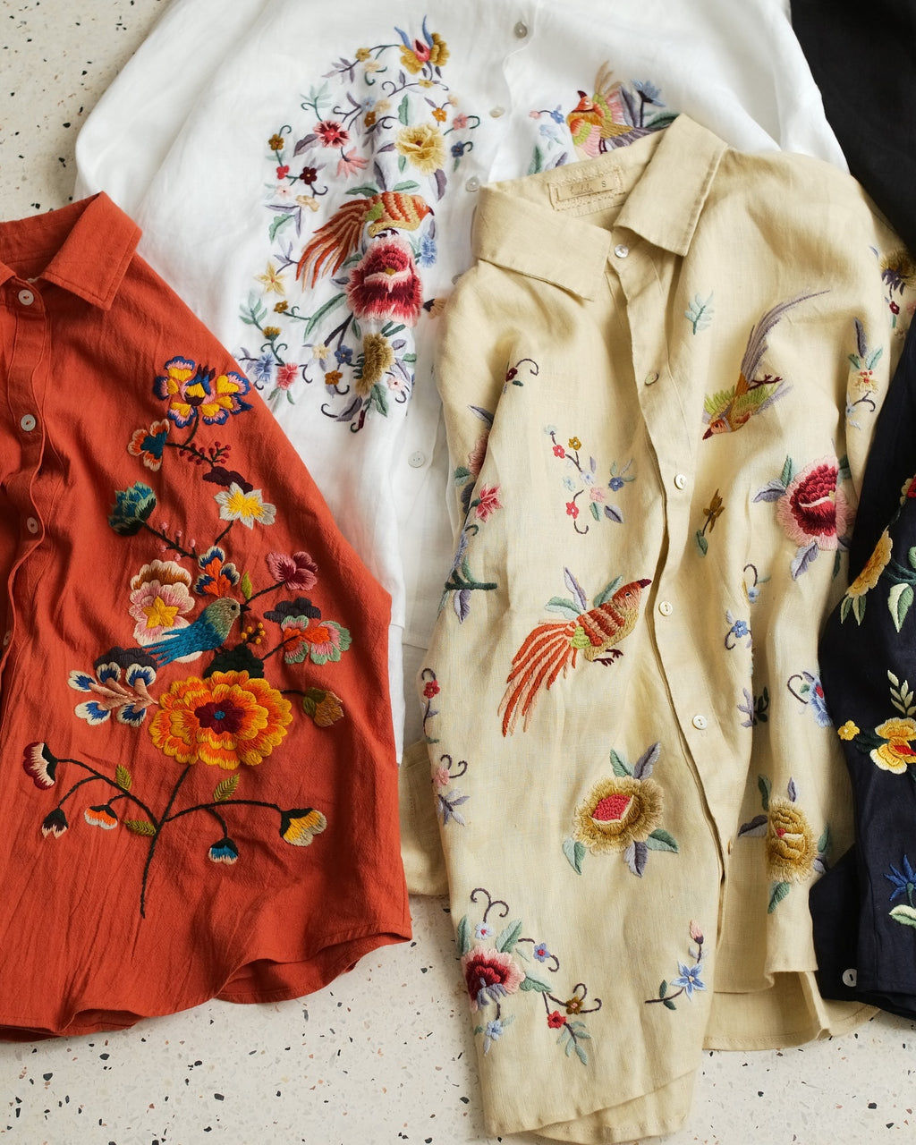 "Vietnamese embroidered linen shirt 'Sophie' in orange with floral patterns by Huulala"