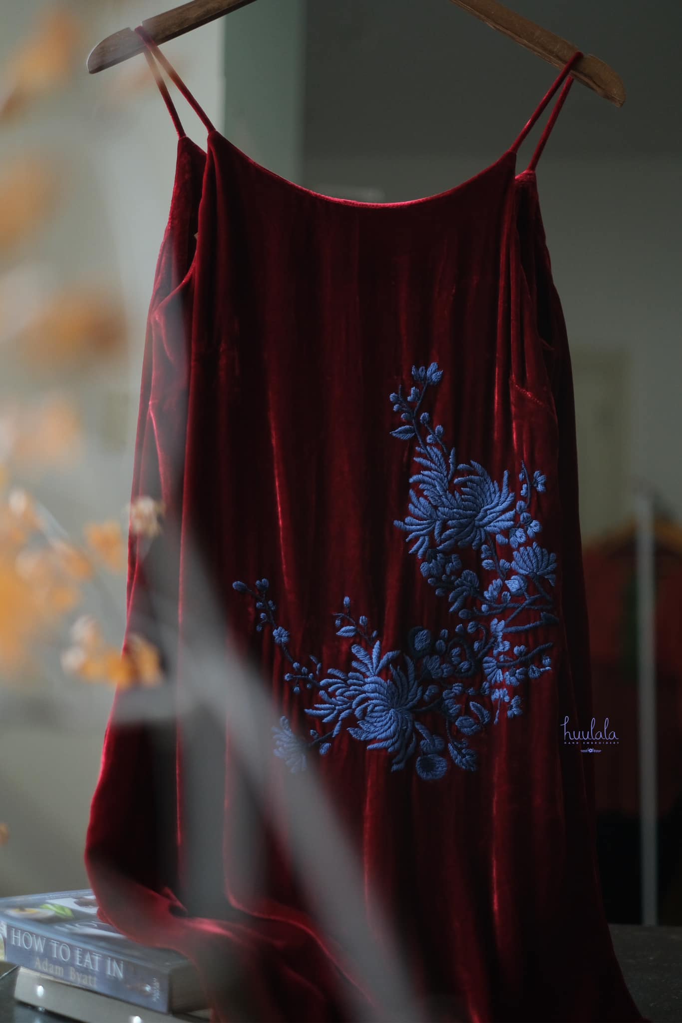 "Rumi - Embroidered Suede Dress in Burgundy by Huulala, featuring blue floral artisan embroidery, cultural authenticity."