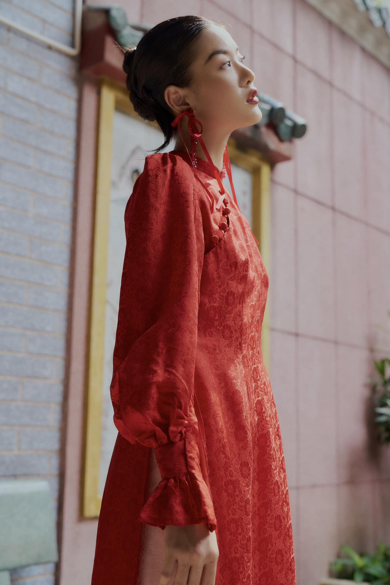 "Tang Bong Ao Dai Set in red silk with puff sleeves, traditional Vietnamese dress by SY Design."