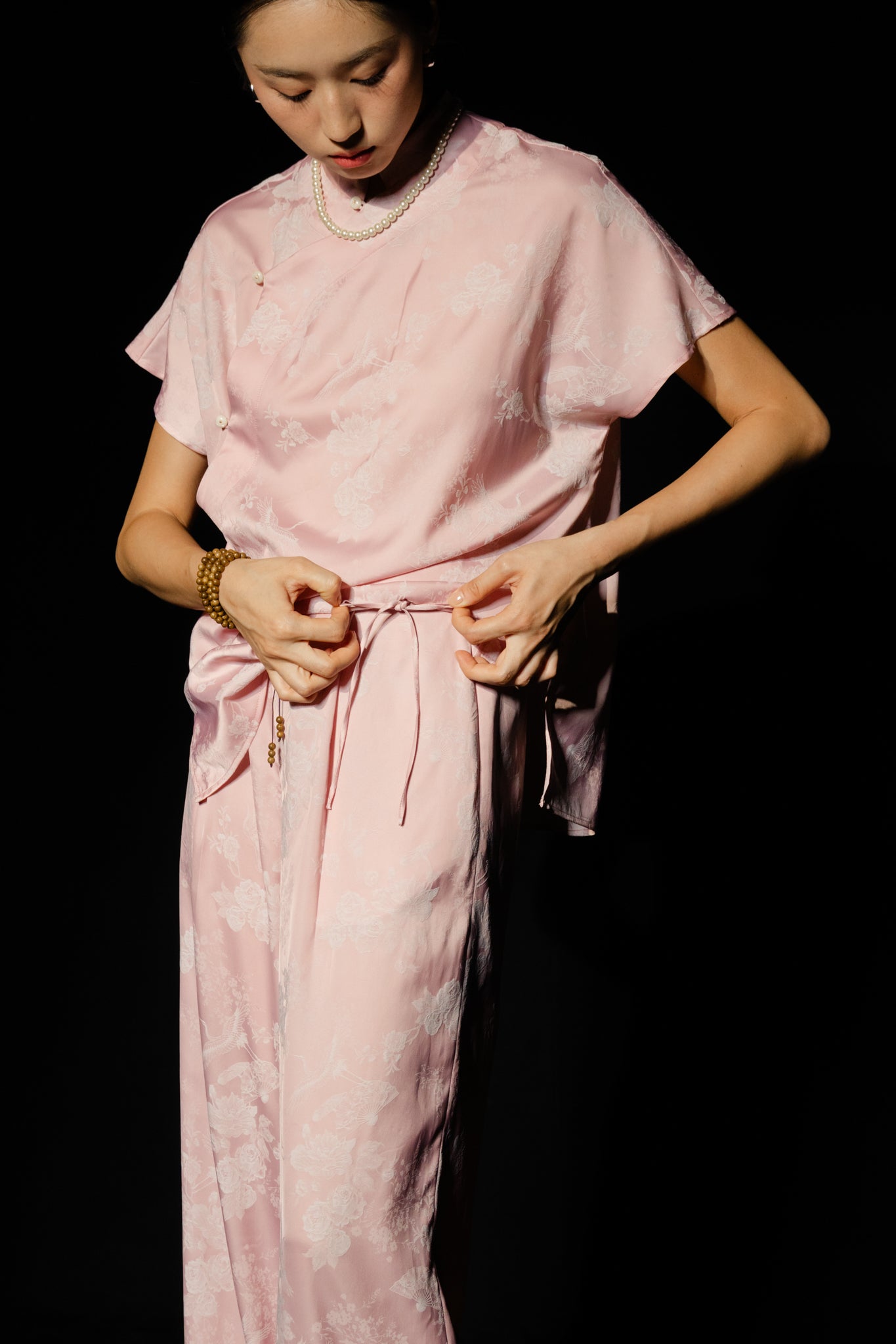 "Yen Chi Set - Mandarin-neck top and pants in pastel pink silk jacquard, modern Vietnamese design"